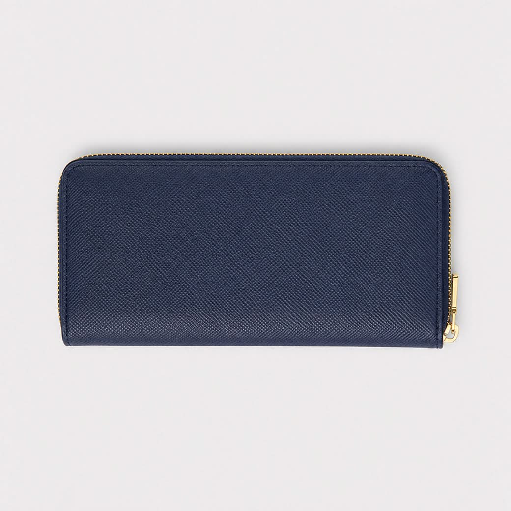 Billetera Alessandro de Maison Caviar en color azul, con detalles elegantes y cierre, muestra el diseño y textura del cuero.