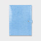 Funda para iPad Maison Caviar en color azul bebé, protección elegante para tableta con diseño suave y resistente.