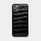 Funda para iPhone Siena de Maison Caviar en color negro con diseño elegante y protección para el teléfono móvil.