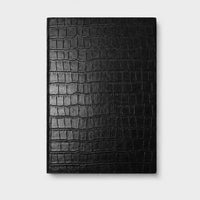 Agenda Sicilia de Maison Caviar en color negro con diseño elegante y páginas internas para planificación diaria.