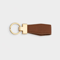 Llavero Maison Caviar Denver en color camel, con diseño elegante y detalles de alta calidad, para accesorios de moda.