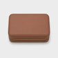 Joyero Maison Caviar Londres en color camel, con compartimentos para joyas y diseño elegante.