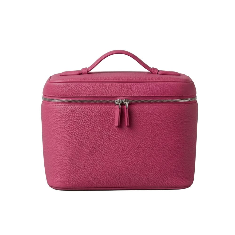 Bolsa de viaje Camille de Maison Caviar, vista lateral con asas y compartimentos, ideal para viajes cortos y elegantes.