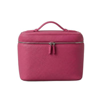 Bolsa de viaje Camille de Maison Caviar, vista lateral con asas y compartimentos, ideal para viajes cortos y elegantes.