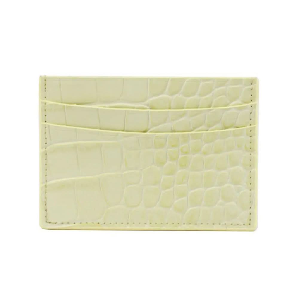 Tarjetero Maison Caviar Cannes en color amarillo pastel, con diseño elegante y compacto para tarjetas de crédito y débito.
