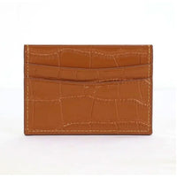 Tarjetero Maison Caviar Cannes en color camel, con múltiples ranuras para tarjetas, hecho de cuero elegante y resistente.