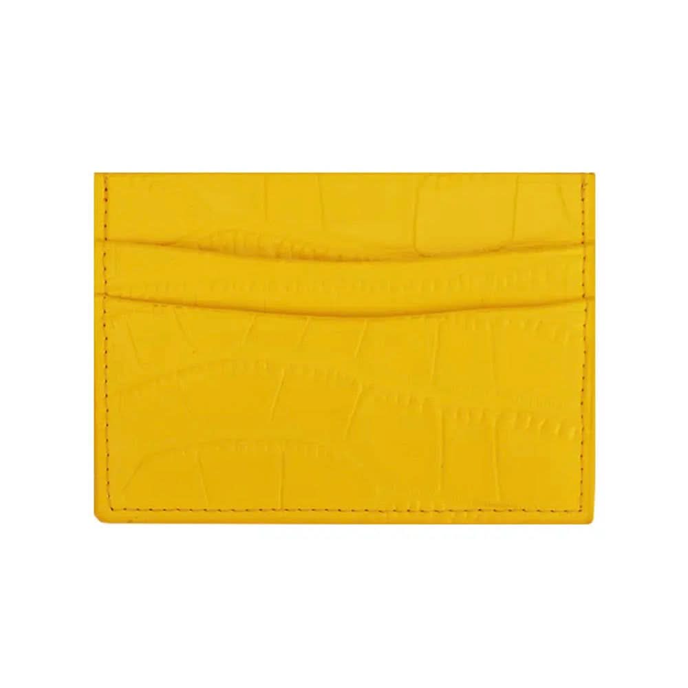 Tarjetero amarillo Maison Caviar Cannes, hecho de cuero, con múltiples ranuras para tarjetas y diseño elegante.