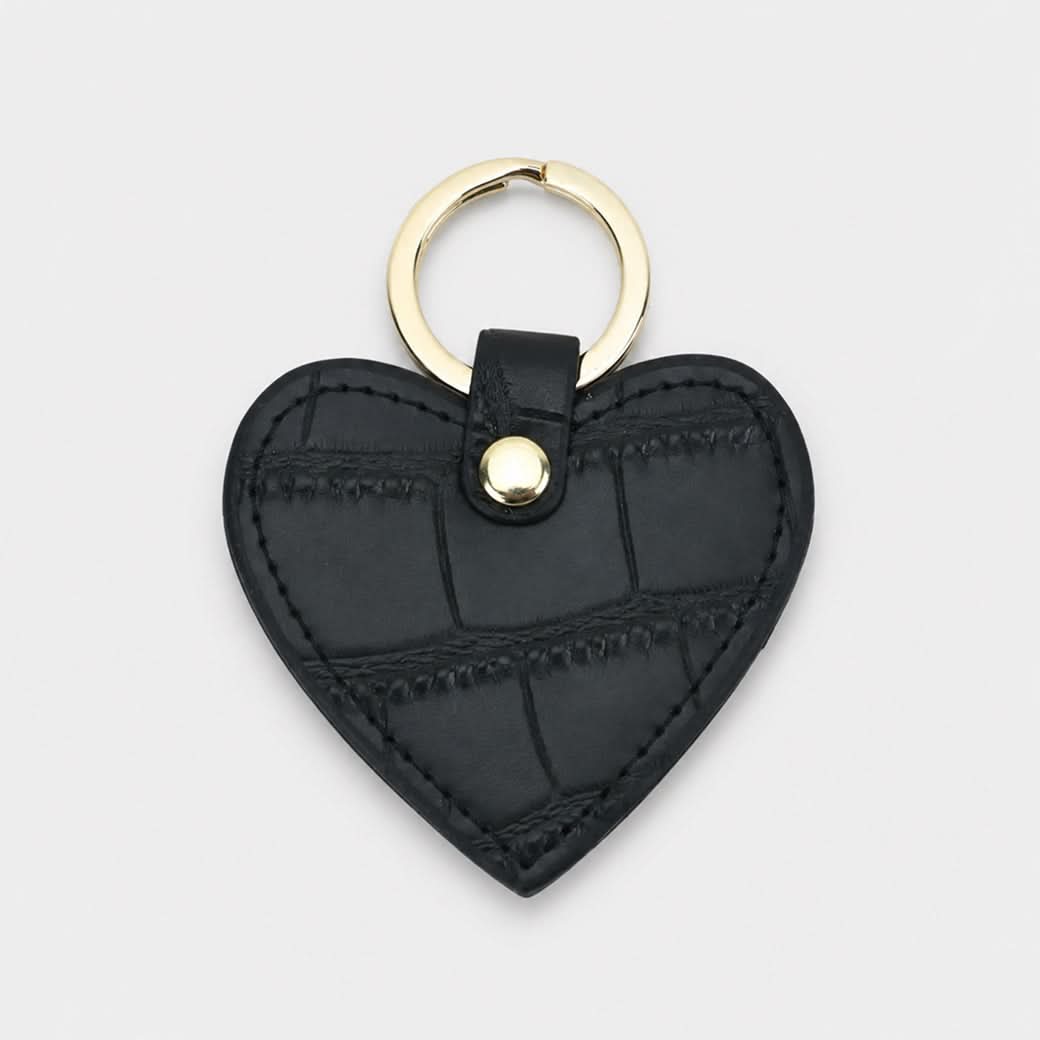 Llavero Maison Caviar Lyon en forma de corazón, con diseño elegante y detalles en metal, ideal para llevar en llaves.