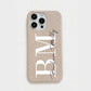 Funda para iPhone Alana de Maison Caviar en color crema, protección y estilo para el teléfono móvil.