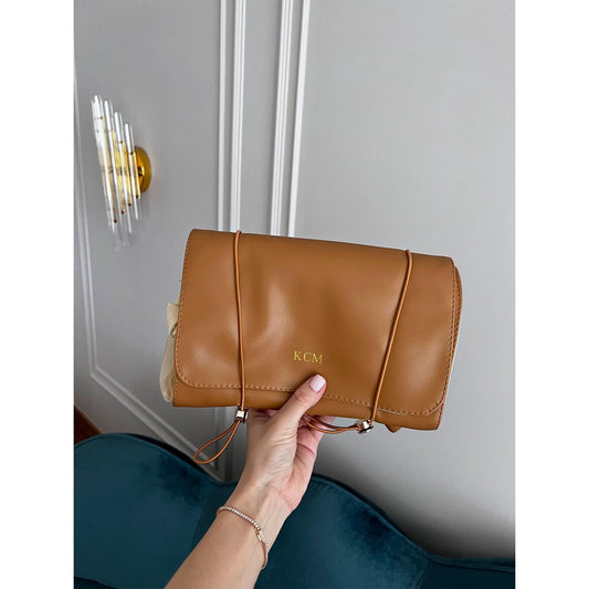 Bolsa de maquillaje Enzo de Maison Caviar, bolsa de vanity con compartimentos para cosméticos y accesorios de belleza.