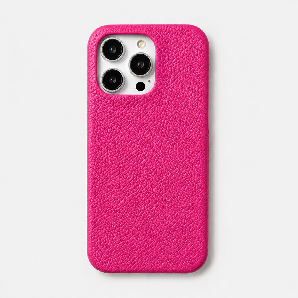 Funda rosa fucsia para iPhone, marca Maison Caviar, con diseño elegante y protección para el teléfono móvil.