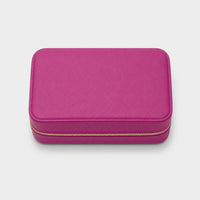 Joyero Maison Caviar Londres en color fucsia, con compartimentos y diseño elegante para joyas y accesorios.