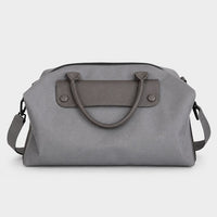 Bolso gris Maison Caviar de la colección de bolsos Salvatore, con diseño elegante y detalles en la superficie.