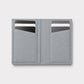 Billetera gris Maison Caviar Alphonse, elegante y compacta, con detalles de alta calidad y diseño sofisticado.