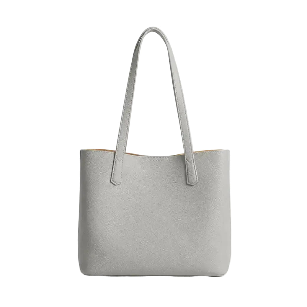 Bolso gris Maison Caviar de la colección bolsos Francesca, con diseño elegante y detalles en cuero.