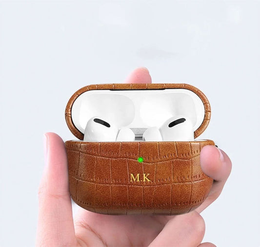 Funda para Airpods Maison Caviar con diseño de Ámsterdam, protección de silicona en color negro para auriculares inalámbricos.
