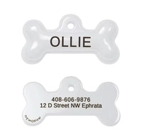 Collar para mascota Ollie de Maison Caviar con plaquita, en color gris con detalles elegantes, en una superficie blanca.