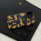Funda para MacBook Monaco de Maison Caviar, protección elegante en color gris, con textura suave y diseño ajustado.
