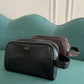 Bolso de viaje Giorgio de la marca Maison Caviar, bolso de mano de cuero con asa y compartimentos internos.