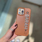 Funda para iPhone Celine de Maison Caviar, protección elegante con diseño sofisticado, en color negro con detalles dorados.