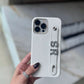 Funda para iPhone Celine de Maison Caviar, protectora y elegante, con detalles en cuero y diseño sofisticado visible en la imagen.
