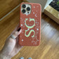 Funda para iPhone Maison Caviar Alice, protección delgada con diseño elegante en color claro, vista frontal del producto.