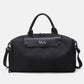 Bolso Salvatore de Maison Caviar, bolso de mano elegante en cuero con detalles metálicos, visible en la imagen.