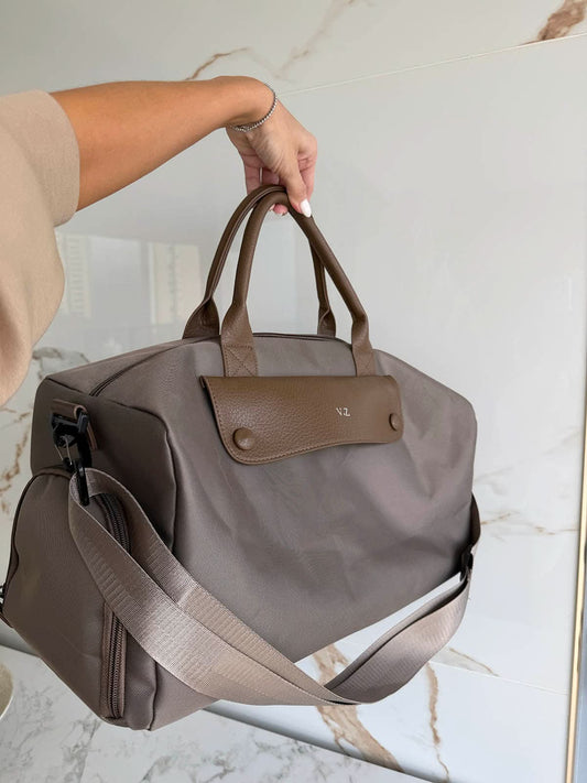 Bolso Salvatore de Maison Caviar, bolso de moda con diseño elegante y detalles en cuero en la imagen.