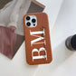 Funda para iPhone Alana de Maison Caviar en color negro, con diseño elegante y protección para el teléfono móvil.