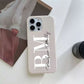 Funda para iPhone Alana de Maison Caviar, protección elegante en cuero con detalles decorativos, vista frontal del producto.