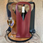 Porta vino Maison Caviar Bastian, soporte elegante para botellas de vino en madera natural con diseño moderno.