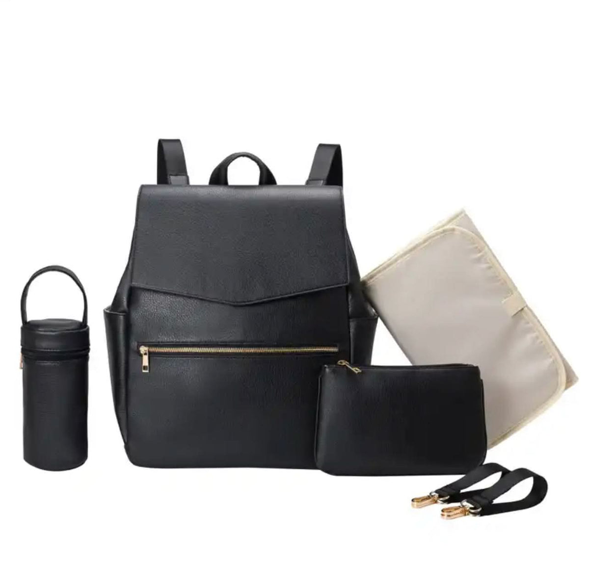 Pañalera Maison Caviar con múltiples compartimentos y asas, diseñada para llevar artículos de bebé de manera cómoda y elegante.