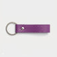 Llavero Capri de Maison Caviar en color morado claro, con diseño elegante y detalles decorativos para llaves y accesorios.