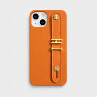 Funda para iPhone Celine de Maison Caviar en color naranja, protección y estilo para tu teléfono móvil.