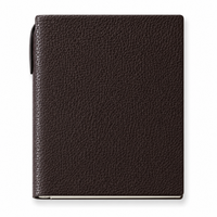Agenda Margot de Maison Caviar en color negro con diseño elegante y tamaño compacto para organización diaria.
