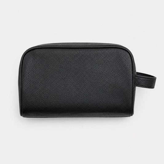 Bolso de viaje negro de Maison Caviar, bolso tipo maleta con asas resistentes y cierre superior, ideal para viajes largos.
