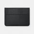 Funda para MacBook Maison Caviar Nobu en cuero negro con textura de cocodrilo, protección elegante para portátil.