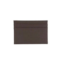 Tarjetero Maison Caviar Nina de cuero negro con cierre y compartimentos para tarjetas, elegante y compacto.