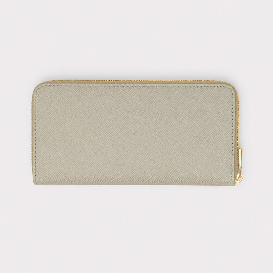 Billetera Alessandro de Maison Caviar en color nude, con detalles elegantes y espacio para tarjetas y dinero en efectivo.