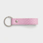 Llavero rosa de Maison Caviar con diseño elegante, ideal para sujetar llaves con estilo.