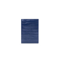 Porta pasaporte Egeo de Maison Caviar, con diseño elegante y cierre de cremallera, en color negro con detalles dorados.