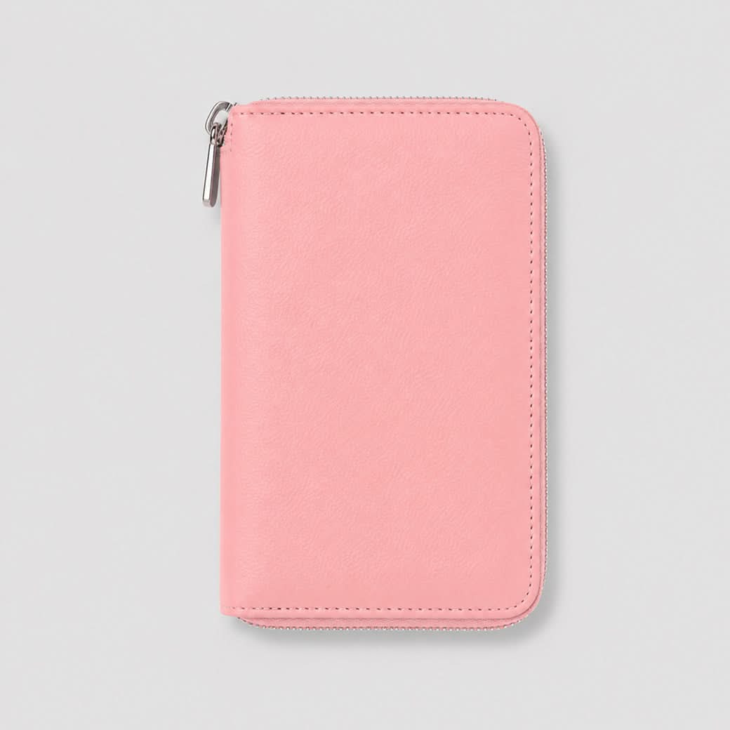 Billetera rosa Greta de Maison Caviar, elegante y compacta, con cierre y detalles en cuero de alta calidad.