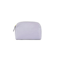 Bolsa de tocador Salamanca de Maison Caviar, elegante y compacta, con detalles en cuero y espacio para artículos de belleza.