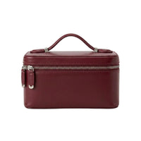 Bolsa de maquillaje Gerard de Maison Caviar, estética y funcional, con compartimentos para cosméticos y accesorios.