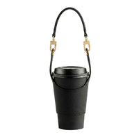 Porta pasaporte Maison Caviar con diseño de vaso New York, ideal para llevar documentos y pasaporte con estilo.