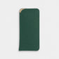 Estuche para gafas Maison Caviar en color verde, con diseño elegante y compacto para proteger las gafas.