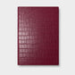 Agenda Sicilia de Maison Caviar en color vinotinto con diseño elegante y tamaño compacto para organización diaria.