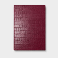 Agenda Sicilia de Maison Caviar en color vinotinto con diseño elegante y tamaño compacto para organización diaria.