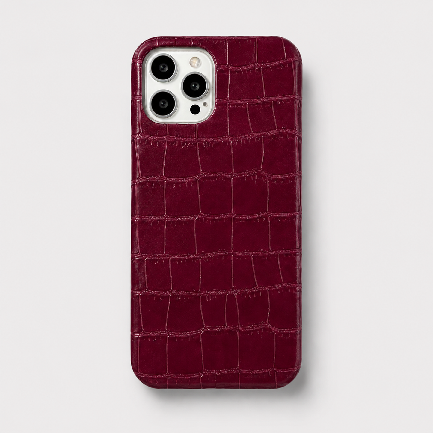 Funda para iPhone Maison Caviar Milan de color vino tinto, protección elegante para teléfono móvil.