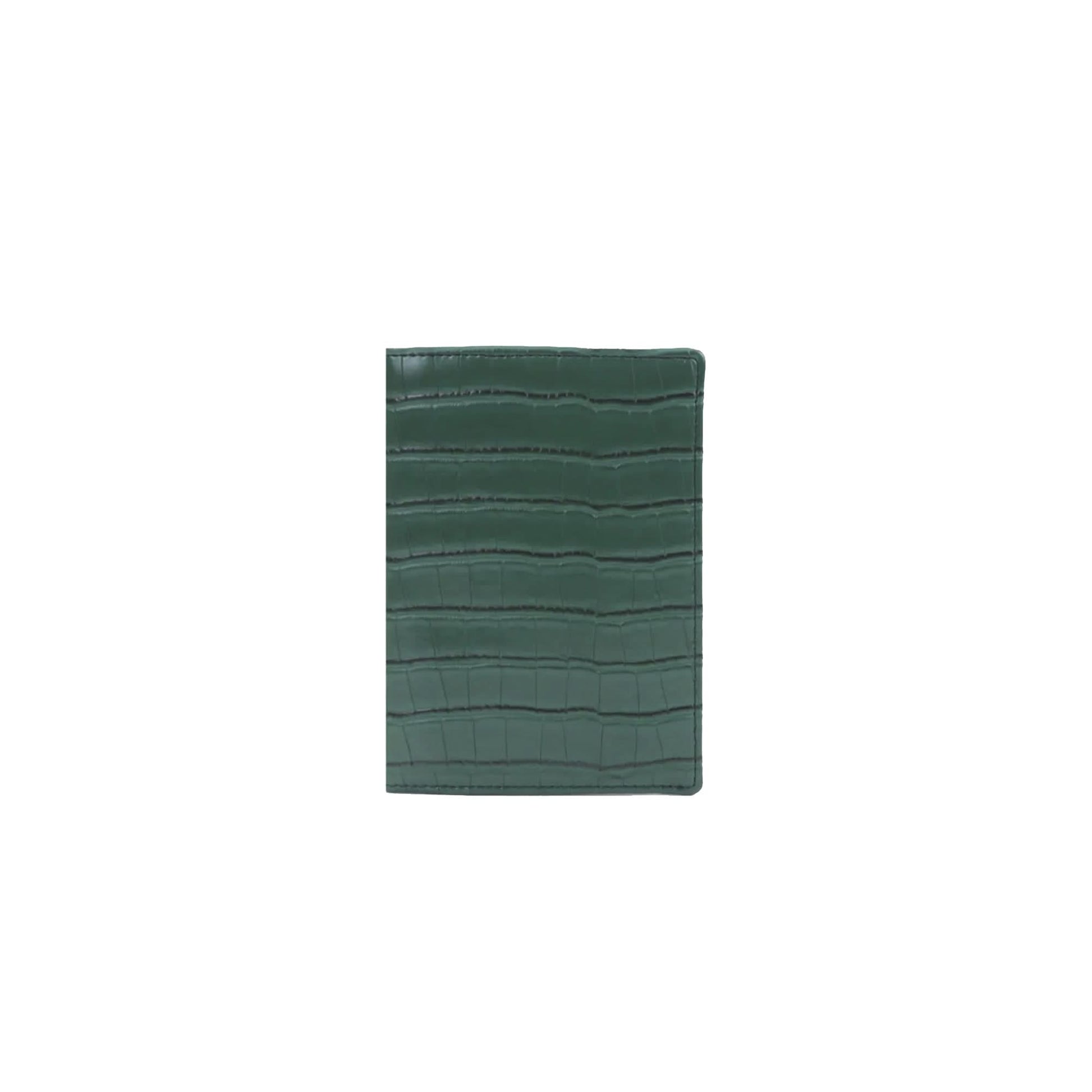 Porta pasaporte Maison Caviar en color verde esmeralda, con diseño elegante y práctico para viajes y protección de documentos.